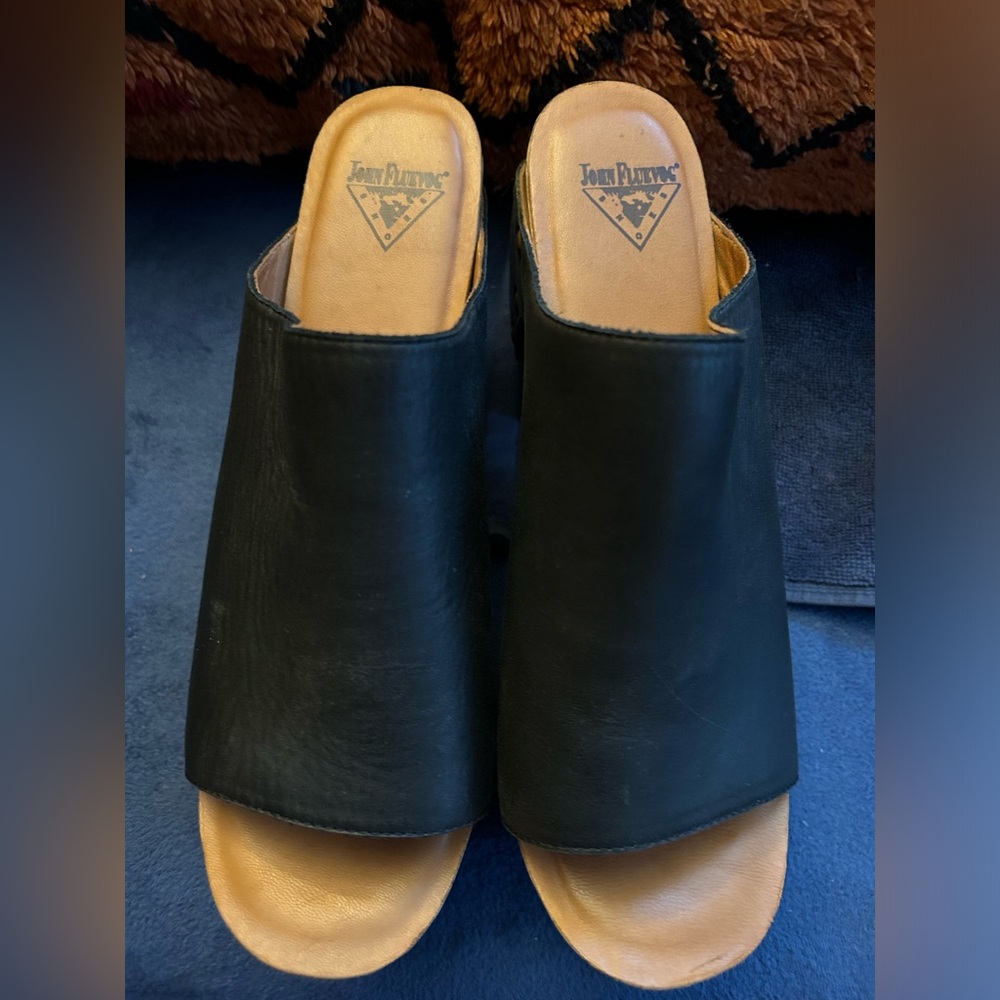 I am selling John Fluevog high heeled clogs.  I absolutely love these.